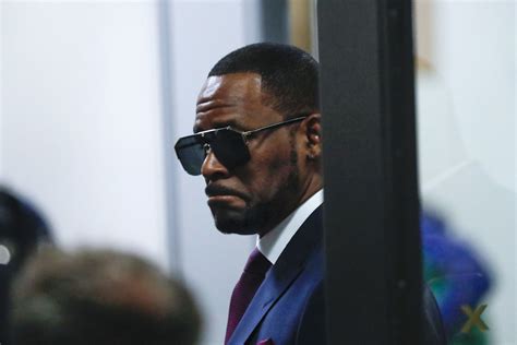 R. Kelly sentenced to 30 years in prison for federal racketeering .